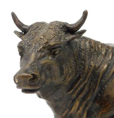 A 20thC bronze figure of a standing bull, on a rustic base, 24.5cm high. - 6