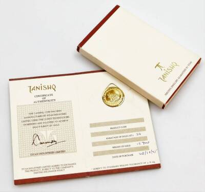 A Tanishq gold coin, depicting two Hindu figures, stamped 995 fine gold, 10g, in presentation sleeve and certificate of authenticity, 24kt, purchased 20/10/05. - 3