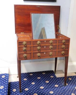 A George IV mahogany enclosed dressing table, the rectangular top with a moulded edge enclosing a fitted interior with a central adjustable mirror and various lidded compartments and recesses, the front with an arrangement of seven false drawers and doubl - 3