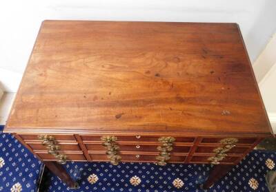 A George IV mahogany enclosed dressing table, the rectangular top with a moulded edge enclosing a fitted interior with a central adjustable mirror and various lidded compartments and recesses, the front with an arrangement of seven false drawers and doubl - 5