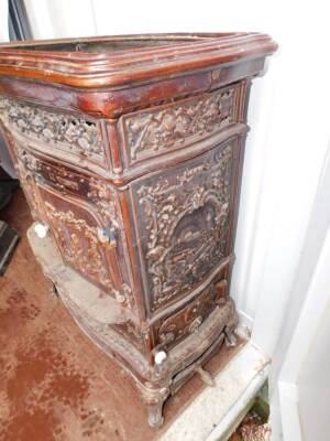 A French late 19thC cast iron and enamel wood burning stove Le Vosgien, No 258, by De Dietrich & Cie., Niederbronn., of serpentine form, the front and sides with a pierced grill moulded with cherubs' heads, the two doors and side panels moulded with castl - 7