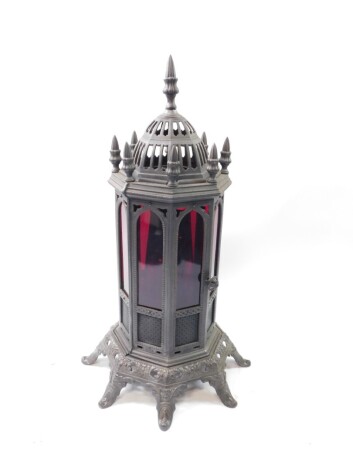 A Rippingilles Albion Lamp Company Ltd late 19thC Sunrise oil heater, c1894, of octagonal form, the pierced lid opening to reveal a kettle stand, above a central door with ruby glass panels opening to reveal a burner, raised on an octagonal stand cast wit