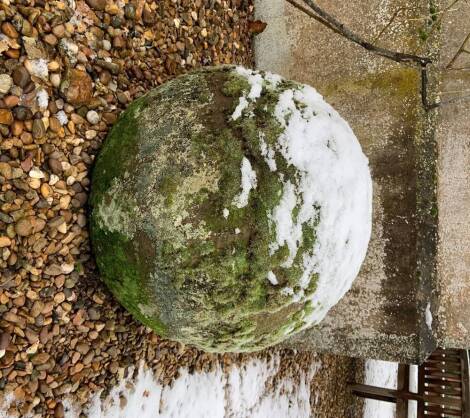 A hand hewn stone petrosphere, 54cm diameter.