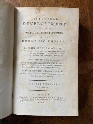 Püter (J. S.) AN HISTORICAL DEVELOPMENT OF THE PRESENT POLITICAL CONSTITUTION OF THE GERMANIC EMPIRE, 3 vol., engraved dedication page, contemporary half calf over patterned boards, T. Payne et al, 1790. - 2