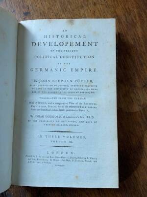 Püter (J. S.) AN HISTORICAL DEVELOPMENT OF THE PRESENT POLITICAL CONSTITUTION OF THE GERMANIC EMPIRE, 3 vol., engraved dedication page, contemporary half calf over patterned boards, T. Payne et al, 1790. - 5