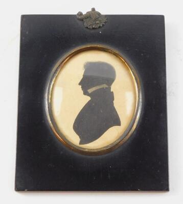 19thC English School. A half length miniature silhouette portrait of a boy, named verso as W Lyon, Aged 13., facing left, with a high collar jacket, 72mm high, 61mm wide.