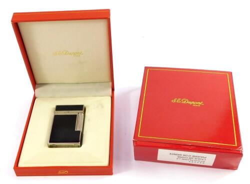 An S T Dupont laque de chine pocket lighter, serial no 4FK12J8, cased and  boxed.