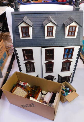 A Georgian style four storey doll's house, the two door front opening to reveal eleven rooms, with electric lighting, 110cm high, 75cm wide., together with dolls house furniture, ornaments and accessories.