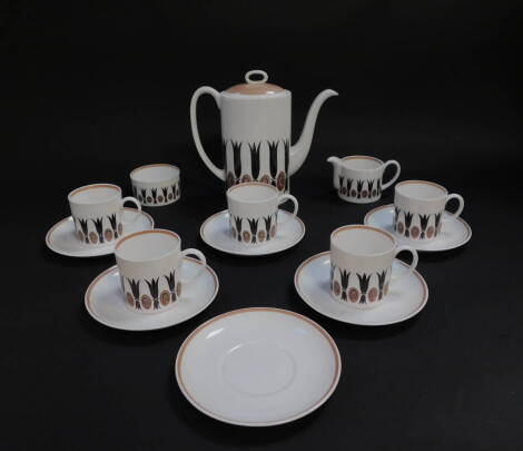 A Susie Cooper porcelain part coffee service decorated in the Corinthian pattern, C2056, printed mark, comprising coffee pot, cream jug, sugar bowl, five cups and six saucers.