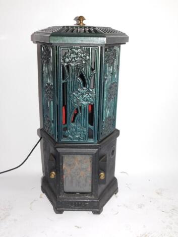 An Esse replica cast iron electric heater, of hexagonal form, with Art Nouveau style floral panelling, 76cm high, 34cm diameter. (AF)