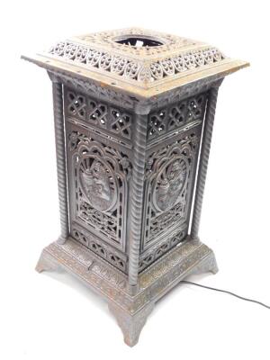 An Omega late 19thC cast iron heater, patent no 22153., of square form, cast with a bear and burner motif, flowers and leaves, the lid stamped Omega Hot Air System, N.A., raised on bracket feet, loosely converted to electricity, 71cm high, 39cm diameter. - 3