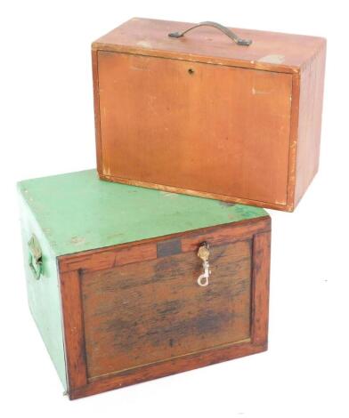 An early 20thC wooden and green painted tool chest, the drop down front bearing a plaque 'Do Not Use The Toilet While The Train Is Standing In The Station', opening to reveal five graduated drawers, 34.5cm high, 46.5cm wide, 38cm deep, and a further tool 