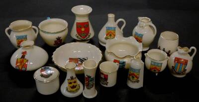 Goss crested china, including a model of the Ancient ewer in Boston Museum, Arms of Cheltenham., dish, Arms of Mundesley., Roman ewer from the original Inn Hospitium found at York, Arms of The Manor of Upton on Severn., and a model of a Roman urn found at