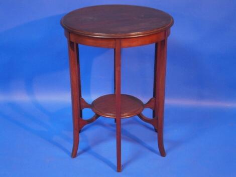 A 20thC mahogany circular top occasional table