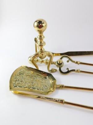 A Victorian brass fireside set, comprising a poker, shovel and pair of coal tongs, together with a pair of andirons and a brass and copper riveted skimer. (6) - 3