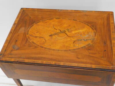 An early 19thC mahogany and satinwood and crossbanded Pembroke table, the rectangular top inlaid with a bow, quiver and a horn, within a crossbanded oval with a moulded edge above an end drawer opposing a false drawer on square tapering legs and brass cas - 3