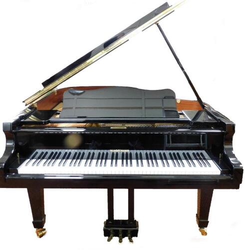 A W.Hoffmann by C Bechstein of Europe baby grand piano, in a black gloss finish, with soft close lid, with three pedals, numbered 176282, 147cm high, 102cm wide, approx 153cm deep