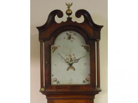 A 18thC oak and mahogany banded long case clock with arch painted dial signed Wainwright