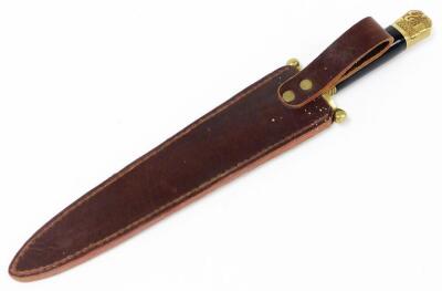 A large dagger, with mahogany ebonised handle and brass hammered end, the blade stamped Middleton & Sons Rockingham Street Sheffield, in a brown leather sheath, 41cm long. - 4