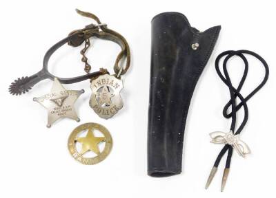 A group of American Wild West badges, uniform and gun holster, to include a black leather gun holster, a sheriffs two pistol string necklace, a Special Ranger Texas & SW Cattle Raisers Association badge, a Texas Rangers badge and an Indian Police badge, t