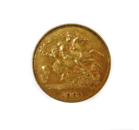 A Edward VII half gold sovereign dated 1902.