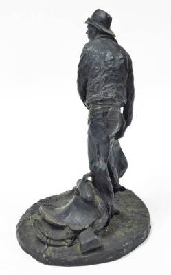 After Michael C Garman. Taking The Rough Off, bronze finished resin figure of a cowboy, signed and dated 1972, 42cm high. (AF) - 2