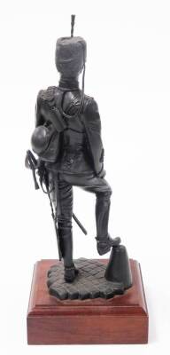 A bronze painted regimental resin figure of a sergeant of 11th Hussars c1890, on a wooden plinth, 36.5cm high. - 3