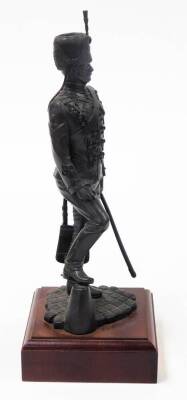 A bronze painted regimental resin figure of a sergeant of 11th Hussars c1890, on a wooden plinth, 36.5cm high. - 4