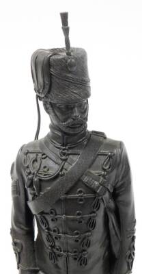 A bronze painted regimental resin figure of a sergeant of 11th Hussars c1890, on a wooden plinth, 36.5cm high. - 6