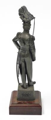 A bronze patinated regimental resin figure of an officer of the 17th/21st Lancers, on a wooden plinth, 42.5cm high, 7cm wide, 6cm deep, the base 4cm high, 13cm wide, 13cm deep. - 3