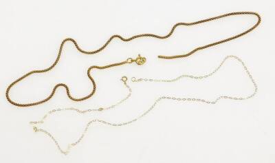 Two chains, comprising a modern chain, gold coloured, marked 800, (AF), 4.5g, and a fine link 9ct gold chain, 0.3g. (2) - 2