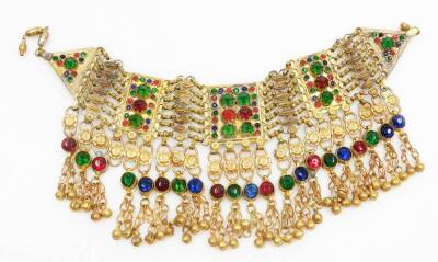 Eastern dress jewellery, to include a brass multi row set choker, with rectangular panels and drop tassels with bells, with matching clip on earrings, a pair of three tiered Indian filigree patterned brass clip on earrings. (3) - 2