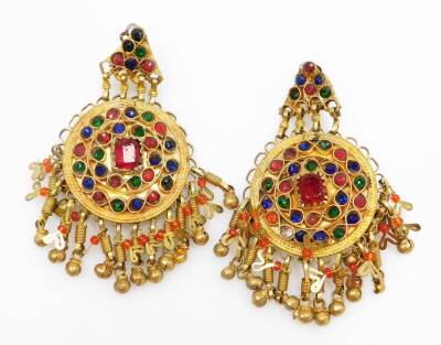 Eastern dress jewellery, to include a brass multi row set choker, with rectangular panels and drop tassels with bells, with matching clip on earrings, a pair of three tiered Indian filigree patterned brass clip on earrings. (3) - 3