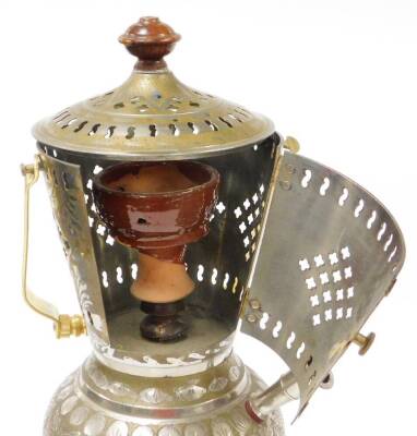 An Eastern shisha pipe, the main body in steel with a gold coloured coating, various piercing and engraving, on a steel body, with a wooden top, on a circular foot, the material pipe with wooden ends, and a gold coloured carrying handle, 53cm high. - 2