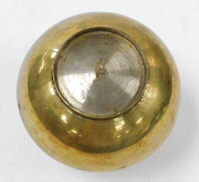 A brass storage canister, the circular fixed top with square handle, on a baluster body with a circular foot, silver coloured to underside, 18cm high. - 4