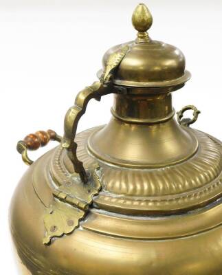 A 20thC copper and brass samovar, with front tap, shouldered body dome and a lid, on a pierced inverted stemmed foot, with turned wooden handles on splayed feet, 79cm high. - 4