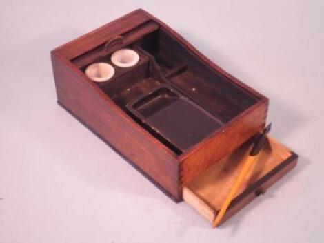 An Edwardian fruitwood artists box with a tambour door and a small frieze drawer