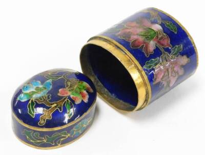 Two oriental cloisonné trinket boxes, the oval example with blue enamel cloisonné decoration on brass, depicting pink and blue flowers 4cm high with lift up lid, the imitation cloisonné urn shaped trinket box, with similar decoration 6cm high. (2) - 4