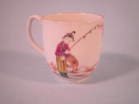 An 18thC English porcelain coffee can decorated with a figure beside a