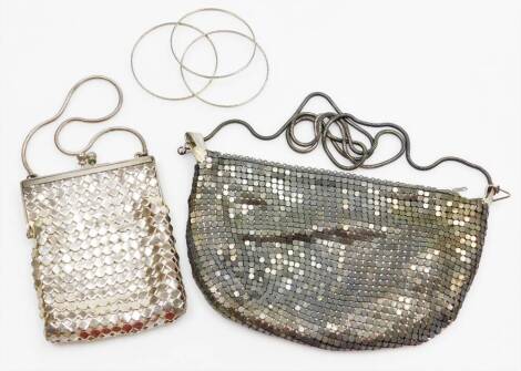 Two ladies evening purses, one steel, with octagonal banded rows on mesh wire, and a further later example. (2)