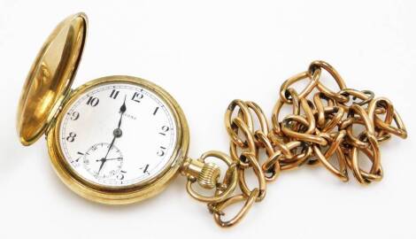 A Record gold plated Hunter pocket watch and chain, with internal engraving presented to A.L.Cleasby by Kendall CWS for 51 years service, the white enamel dial with blue hands and seconds dial, bezel wind, numbered 320602, with a gold plated chain.