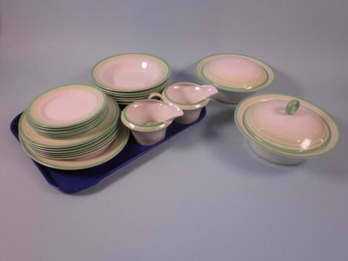 A Shelley part dinner service decorated with green bands to include two tureens and covers