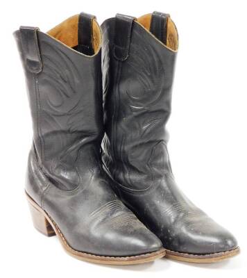 A pair of black leather cowboy boots, stamped Stetson, size unknown.