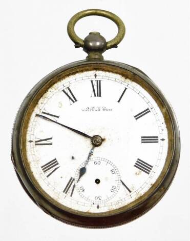 A late 19thC silver pocket watch, stamped A.W.W.Co Waltham Mass, with a white enamel dial with Roman numerals and second style lacking hand and face, with shield crest back, 5cm wide.