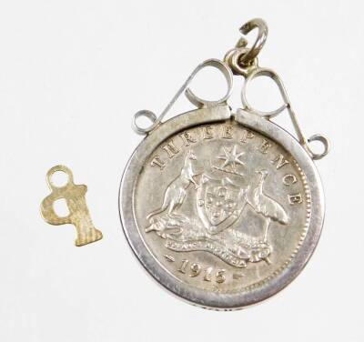 A group of silver and other jewellery, to include a Queens Silver Jubilee silver ingot pendant and chain, a further later silver ingot pendant, two silver dress rings set with citrine, a framed three pence 1915 coin, and a P pendant, 46.4g all in. (6) - 3