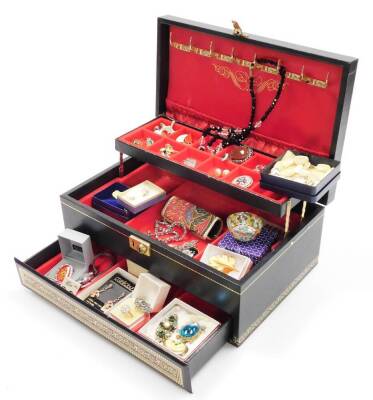 A black faux leather jewellery box and contents, comprising two gold plated dress rings, earrings, pin badges, beaded necklaces, etc. (a quantity)