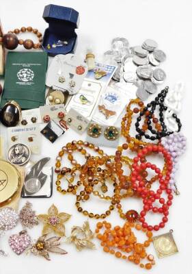 A quantity of costume jewellery and effects, to include a faux pearl necklace, beaded necklaces, tortoiseshell cigarette case, Tram Car collectors tokens, buttons, chains, etc. (2 tray) - 2