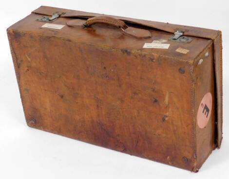 A late 19thC leather travel case, with Ryde Esplanande British Railway stamps, 20cm high, 70cm wide, 40cm deep.