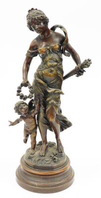 A pair of reproduction plaster figures, each of maidens with children, on a wooden base, stamped La Recompense and La Plus Belle Fleche, 48cm high. - 2