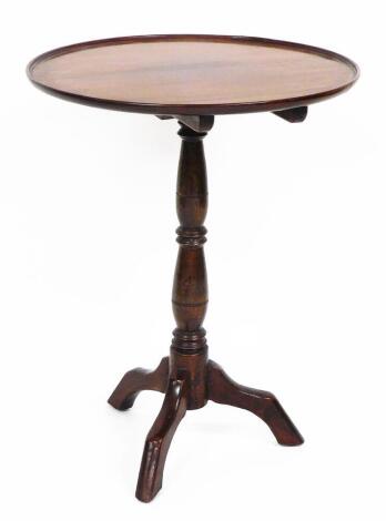 A 19thC mahogany tripod table, the circular top with two ribbed border, on a tripod base, 73cm high, the top 53cm diameter.